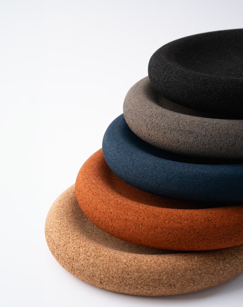 Stacked cork bowls in four colours